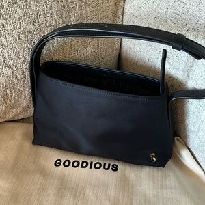 GOODIOUS MINI DRAWSTING POUCH HAND BAG IN BLACK